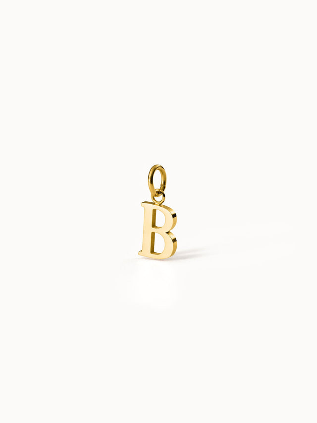 Purelei Pure B Charm, goldener 18K Edelstahl Buchstaben-Anhänger, minimalistisch, elegante Klarheit, strahlend warm.