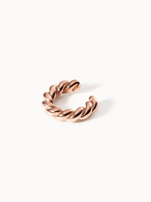 Roségoldenes, gewundenes Ring-Design von PURELEI, elegant und modern.