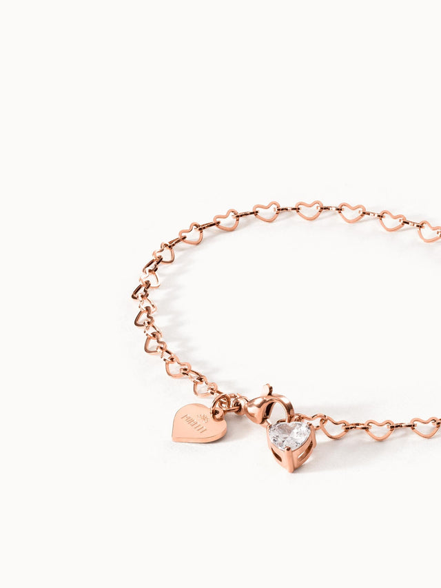 Roségoldenes Armband mit Herzdesign und Kristallanhänger von PURELEI.