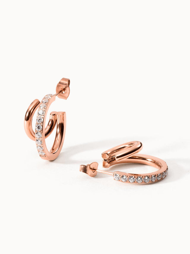 Roségoldene Creolen mit funkelnden Steinen, elegant und modern – PURELEI.