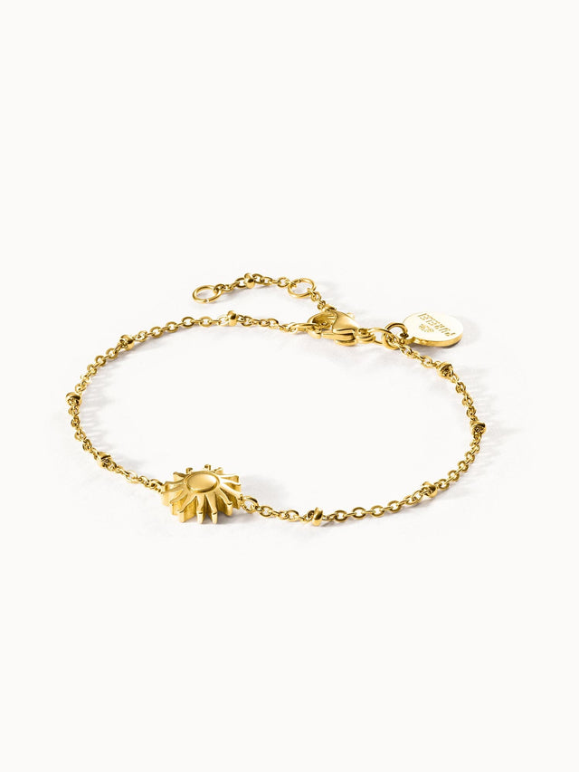 Goldenes Armband mit Sonnenmotiv von PURELEI, elegant und feminin.