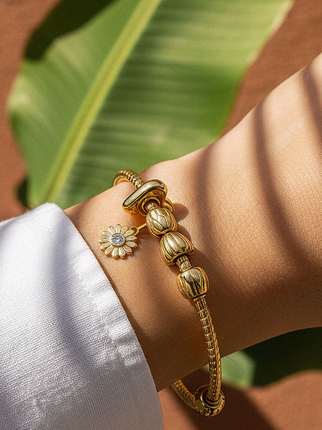 Lei Charm bangle with two stopper charms