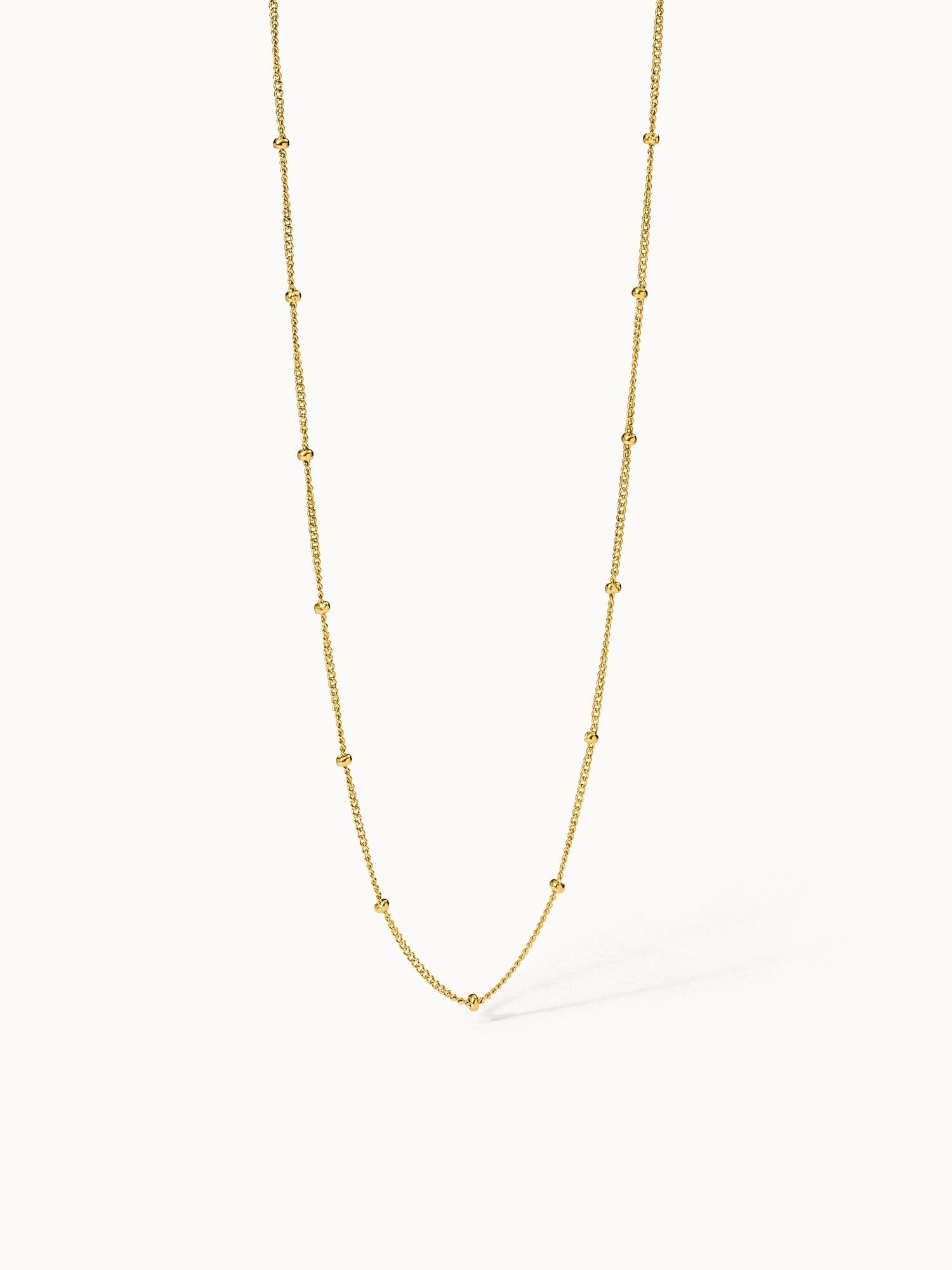 Feingliedrige Li’ili’i Kette aus 18K Gold, minimalistisch und elegant, PURELEI Signature für subtilen Luxusschmuck.