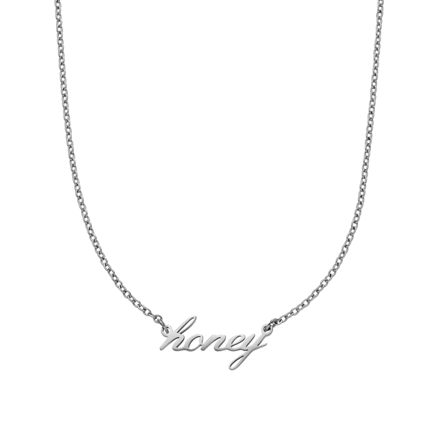 Silberne PURELEI Honey Kette aus Edelstahl mit geschwungenem Schriftzug, elegant und zeitlos gestaltet.